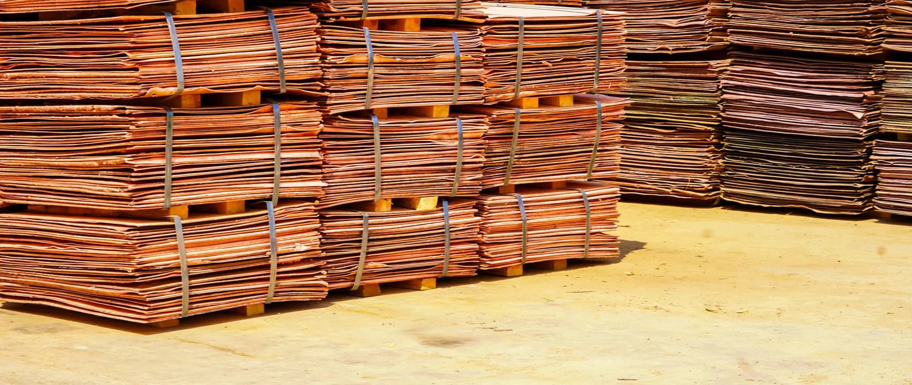 Stacked copper plates ready for loading